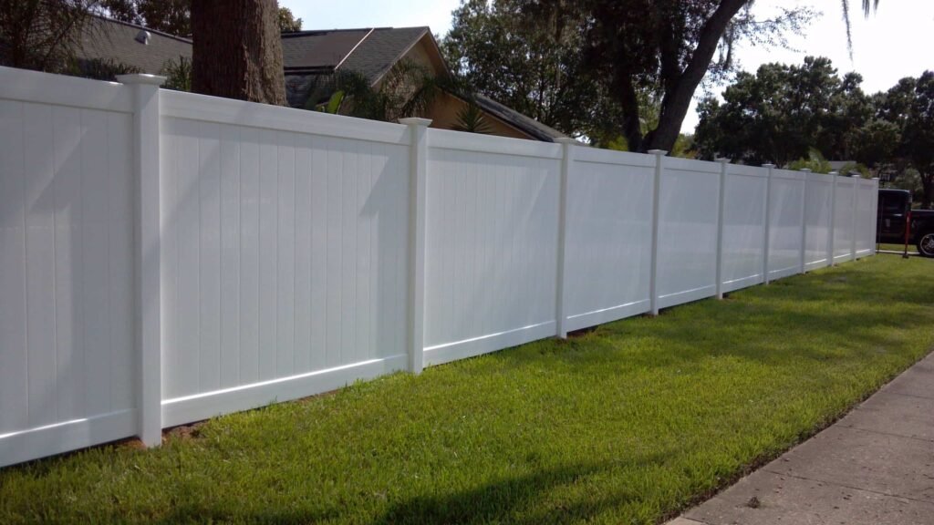 white vinyl fence